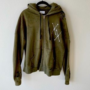 Gently loved, rhinestone accents on crossbones, copper detailed stars on hood